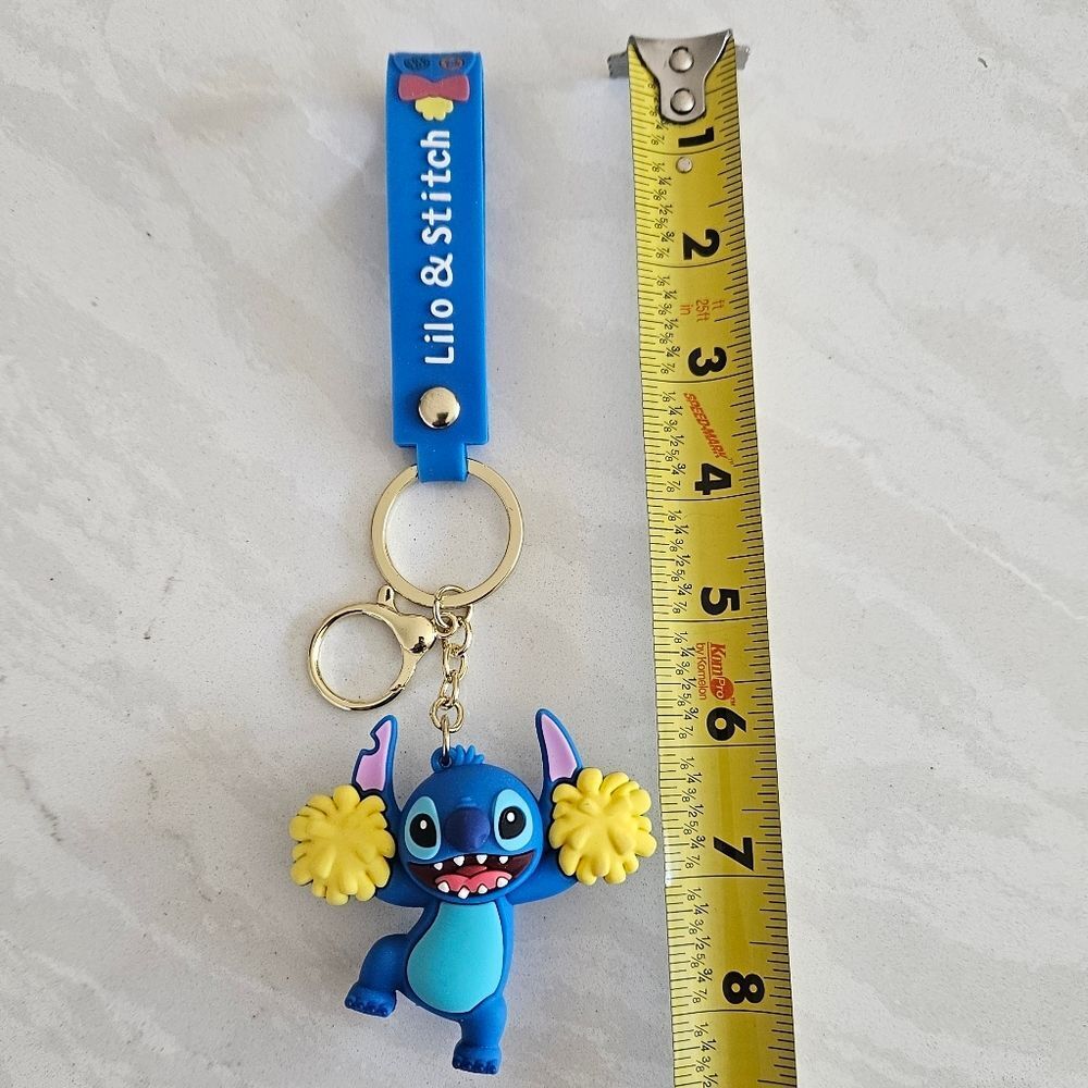 Stitch With Pom Poms Blue and Yellow Keychain Toy - Picture 2 of 5